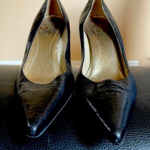 Coach black pointy toe heels.
